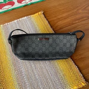 Gucci boat pochette monogram excellent condition